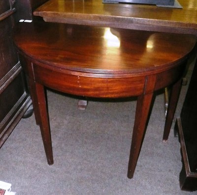 Lot 612A - George III demi-lune fold-over tea table