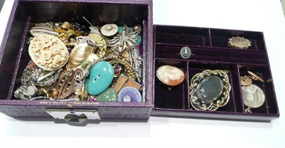 Lot 2 - A purple jewellery box and contents including assorted costume jewellery, paste set dress clip,...
