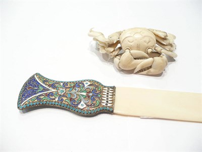 Lot 5 - Russian style ivory page turner and a carved ivory crab (a.f.)