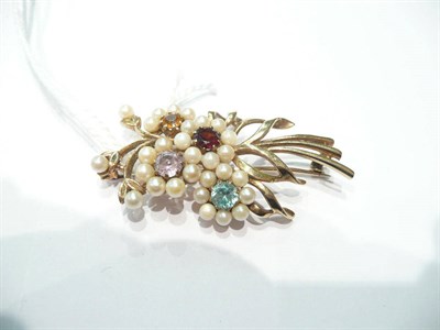 Lot 16 - A 9ct gold cultured pearl and gem set floral brooch