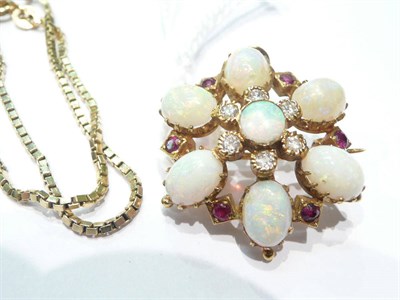 Lot 35 - An 18ct gold opal, ruby and diamond brooch pendant and chain