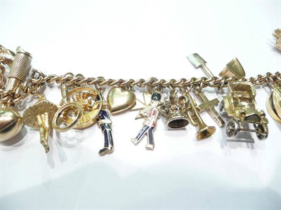 Lot 37 - Gold charm bracelet