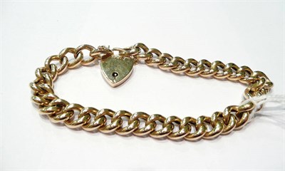 Lot 41 - A curb and lock bracelet stamped '9C'