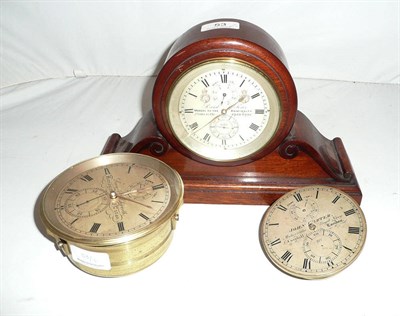 Lot 53 - Three Marine chronometer movements, the first contained in a later mantel clock case, two day...