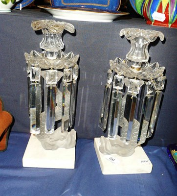 Lot 66 - A pair of Baccarat dolphin candlesticks (a.f.)