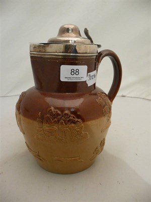 Lot 88 - Silver lidded Doulton stoneware jug