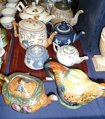 Lot 90 - Eight decorative teapots