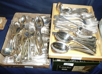 Lot 92 - Silver ladle, fork, two silver tea spoons and two trays of silver plated flatwares including...