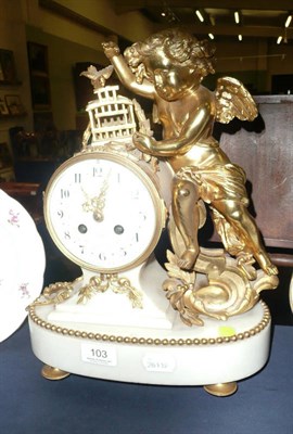 Lot 103 - A French gilt metal and white marble mantel clock