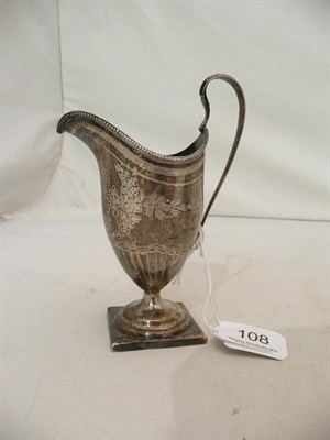 Lot 108 - George III silver helmet cream jug