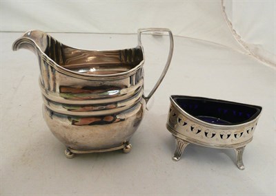 Lot 115 - A Georgian silver cream jug and a Georgian silver salt with glass liner