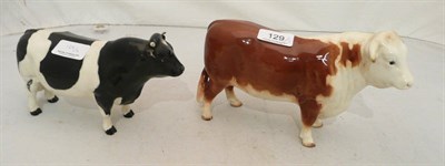 Lot 129 - A Beswick bull and cow