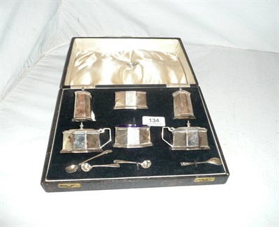 Lot 134 - A six piece silver cruet set, cased