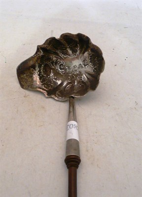 Lot 137 - Georgian embossed silver punch ladle with wood handle