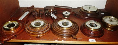 Lot 152 - Four carved oak cased barometers and three other barometers (7)
