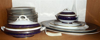 Lot 167 - A Royal Worcester blue and gilt dinner service