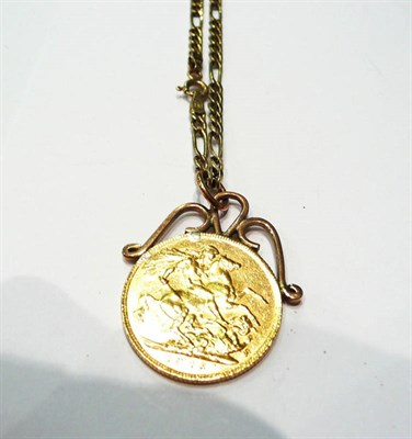 Lot 198 - A full gold sovereign and a chain with clasp stamped '9K'