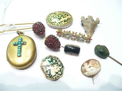 Lot 209 - A Victorian bar brooch set with foil backed stones, locket a strawberry motif hair decoration,...