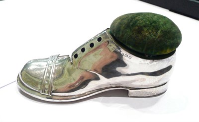 Lot 210 - Large silver shoe combination pin cushion