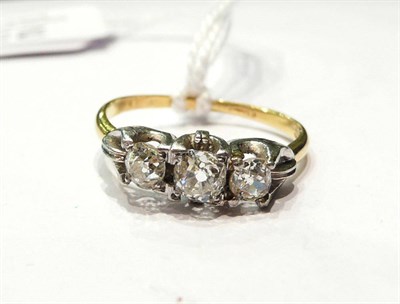 Lot 230 - An old cut diamond three stone ring