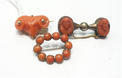 Lot 235 - Three coral brooches (3)