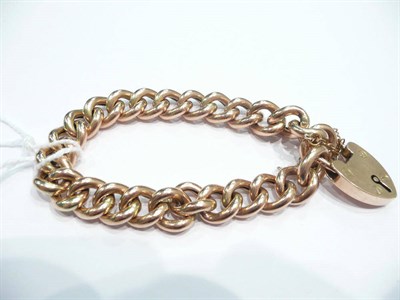 Lot 236 - A curb and lock bracelet