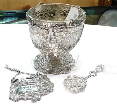 Lot 251 - A silver sugar basket and liner with a port label