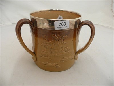 Lot 263 - Silver mounted Doulton stoneware jug