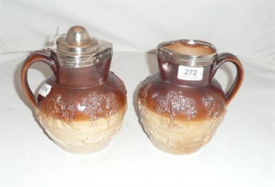 Lot 272 - Two silver mounted Doulton stoneware jugs