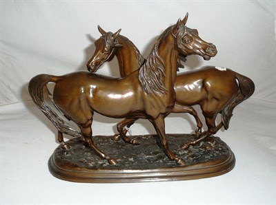 Lot 285 - A spelter figure group of two horses