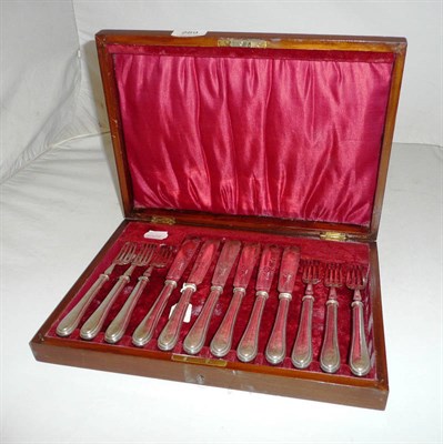 Lot 289 - A cased set of six silver fish knifes and forks