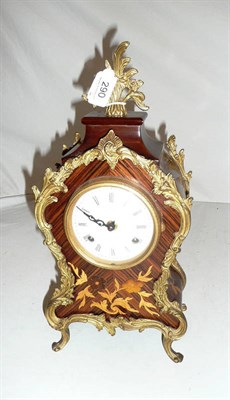 Lot 290 - A reproduction gilt-mounted mantel clock