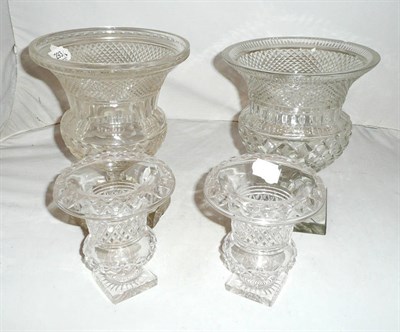 Lot 293 - Four cut glass campana vases