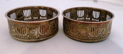 Lot 303 - Pair of silver plated coasters