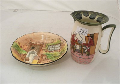 Lot 322 - A Royal Doulton Huntsman series ware water jug, depicting two huntsman in an inn, printed...