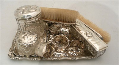 Lot 343 - A silver dressing table set (a.f.) and three silver napkin rings, etc