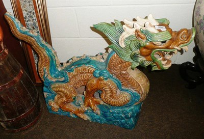 Lot 350 - Pair of glazed dragon figures