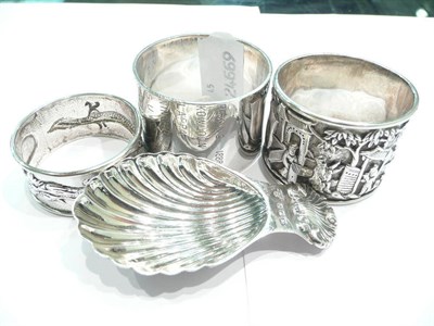 Lot 356 - Three Chinese silver napkin rings and a modern caddy spoon (about 4ozs)