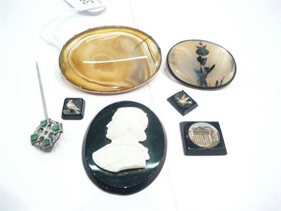 Lot 357 - Two moss agate brooches and another, an agate cameo and a Scottish hardstone pin