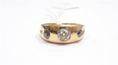 Lot 378 - A gold diamond three stone ring