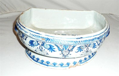 Lot 393 - 18th century blue and white decorated faience font