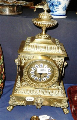 Lot 406 - Brass cased mantel clock (with key and pendulum)