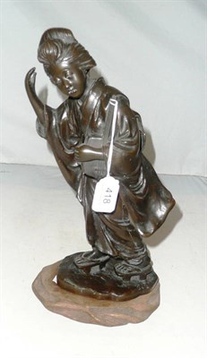 Lot 418 - A Japanese bronze of a lady