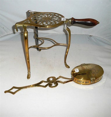 Lot 442 - Pierced brass trivet and a pierced chestnut roaster