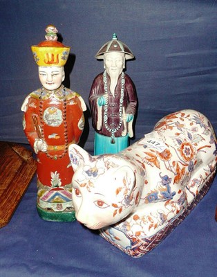 Lot 447 - Two Oriental ceramic figures and a ceramic cat (3)