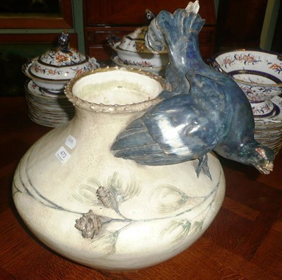 Lot 473 - A large Stellmacher pottery vase mounted with a bird (losses)