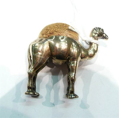 Lot 476 - Silver camel pin cushion