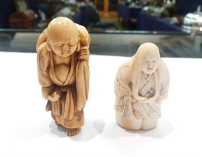 Lot 498 - Japanese ivory 'Kabuki/Noah' actor netsuke, circa 1930 and an ivory netsuke as an Iohan...