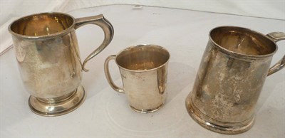 Lot 543 - Three silver tankards (one Georgian (a.f.)), 26oz approximate weight