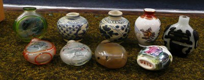 Lot 551 - Two late Ming provincial porcelain jarlets, another, and six assorted snuff bottles including a...